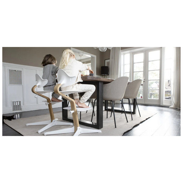 Stokke® Nomi® Stuhl Black/ Black + Babyset gratis